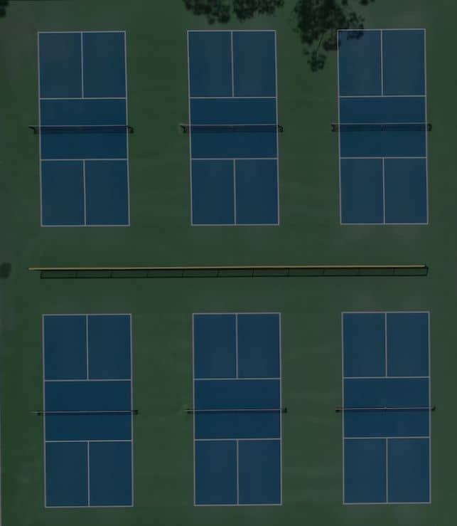 Hero image of pickleball courts